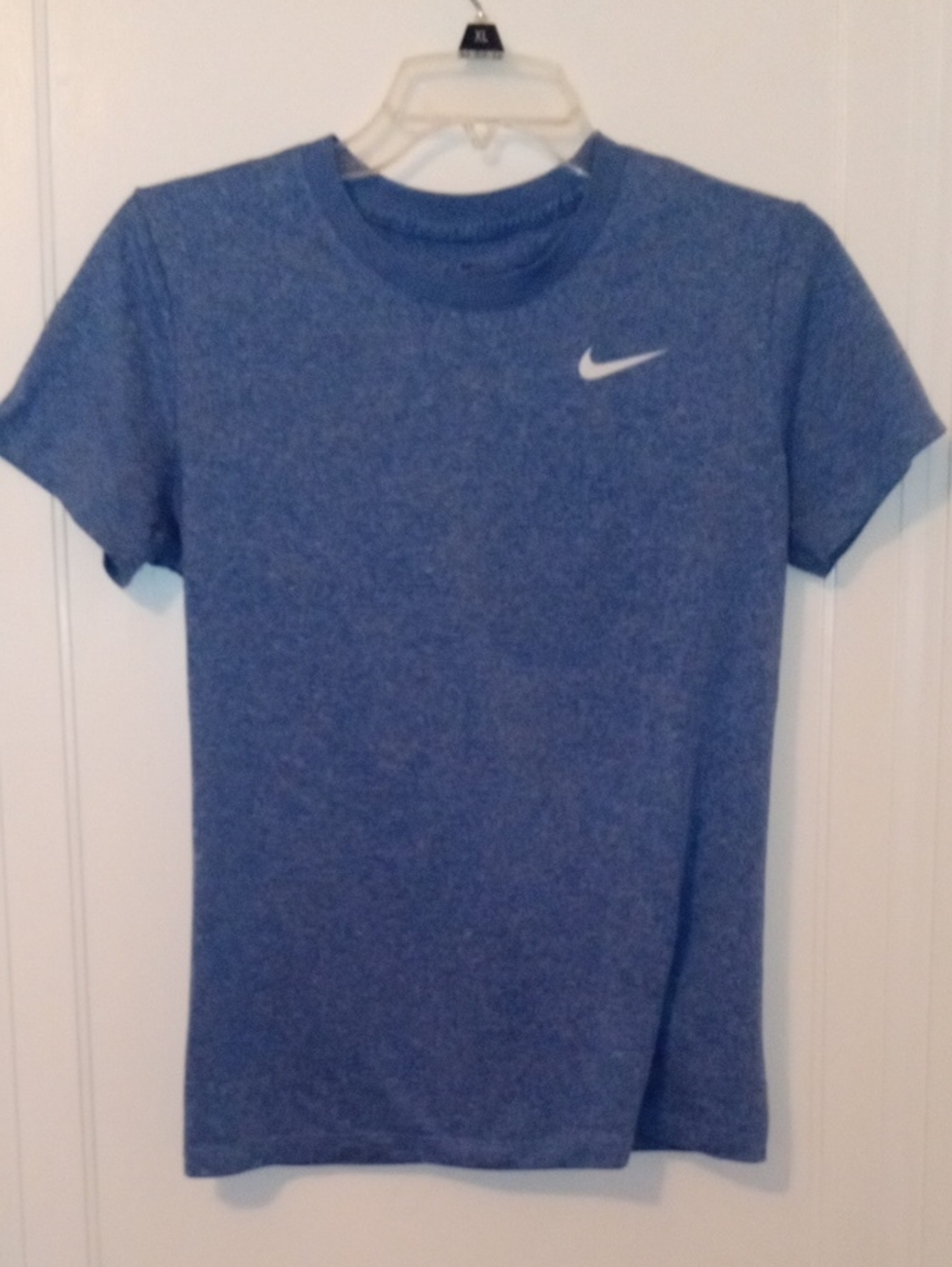 women med NIKE light blue drifit tee